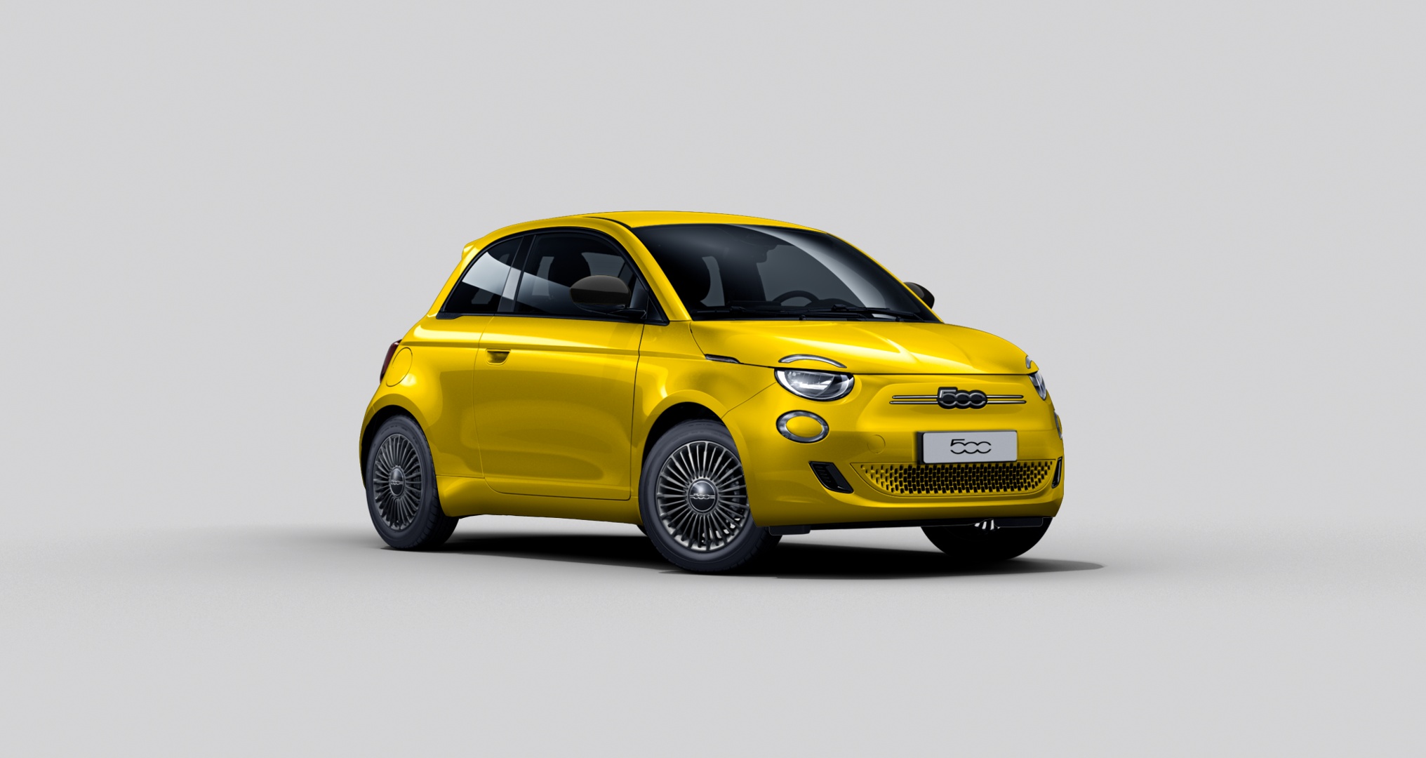 Fiat 500e Icon in der Farbe Sun of Italy Gelb von der Seite vorne