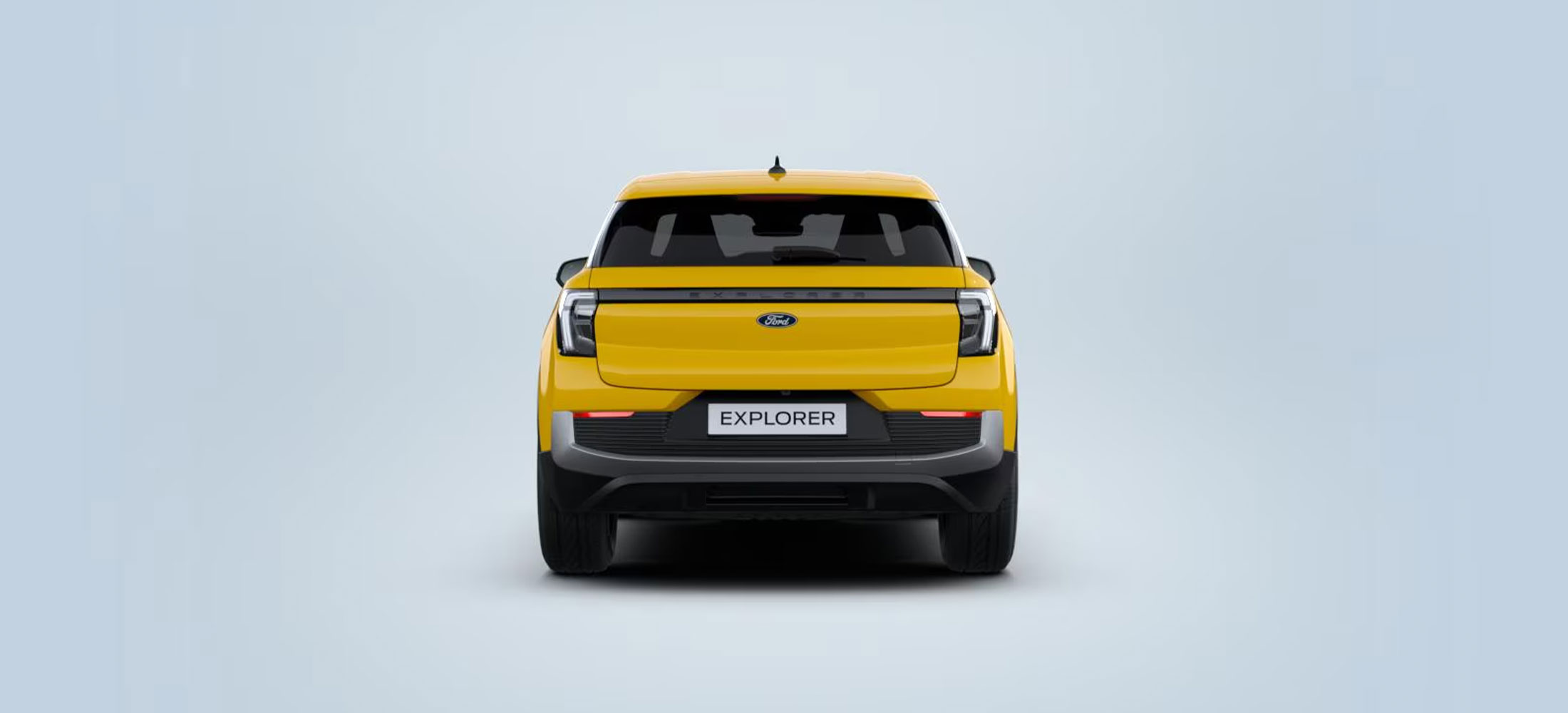 Gelber Ford Explorer in Heckansicht.
