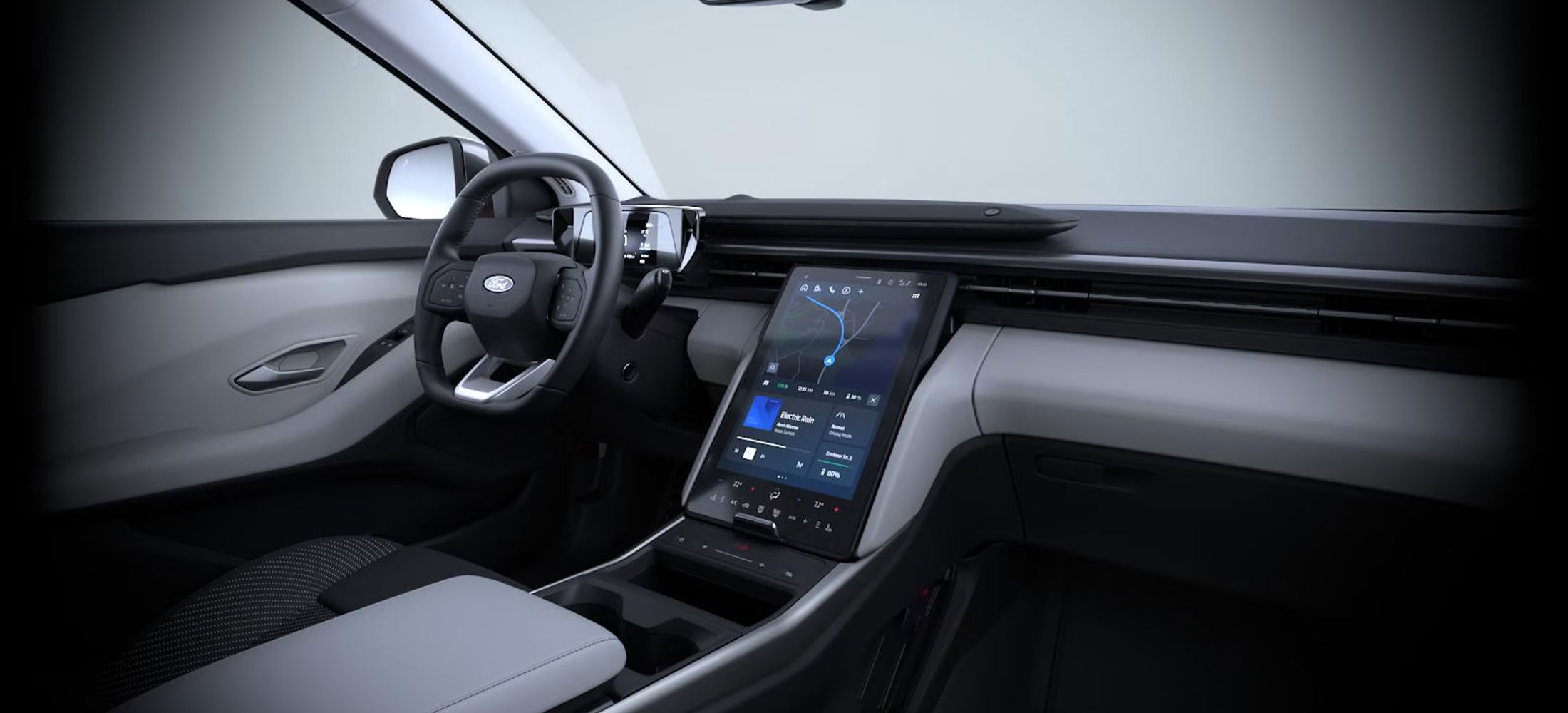 Cockpit des Ford Explorer mit Lenkrad, digitaler Instrumentenanzeige und großem Touchscreen."
