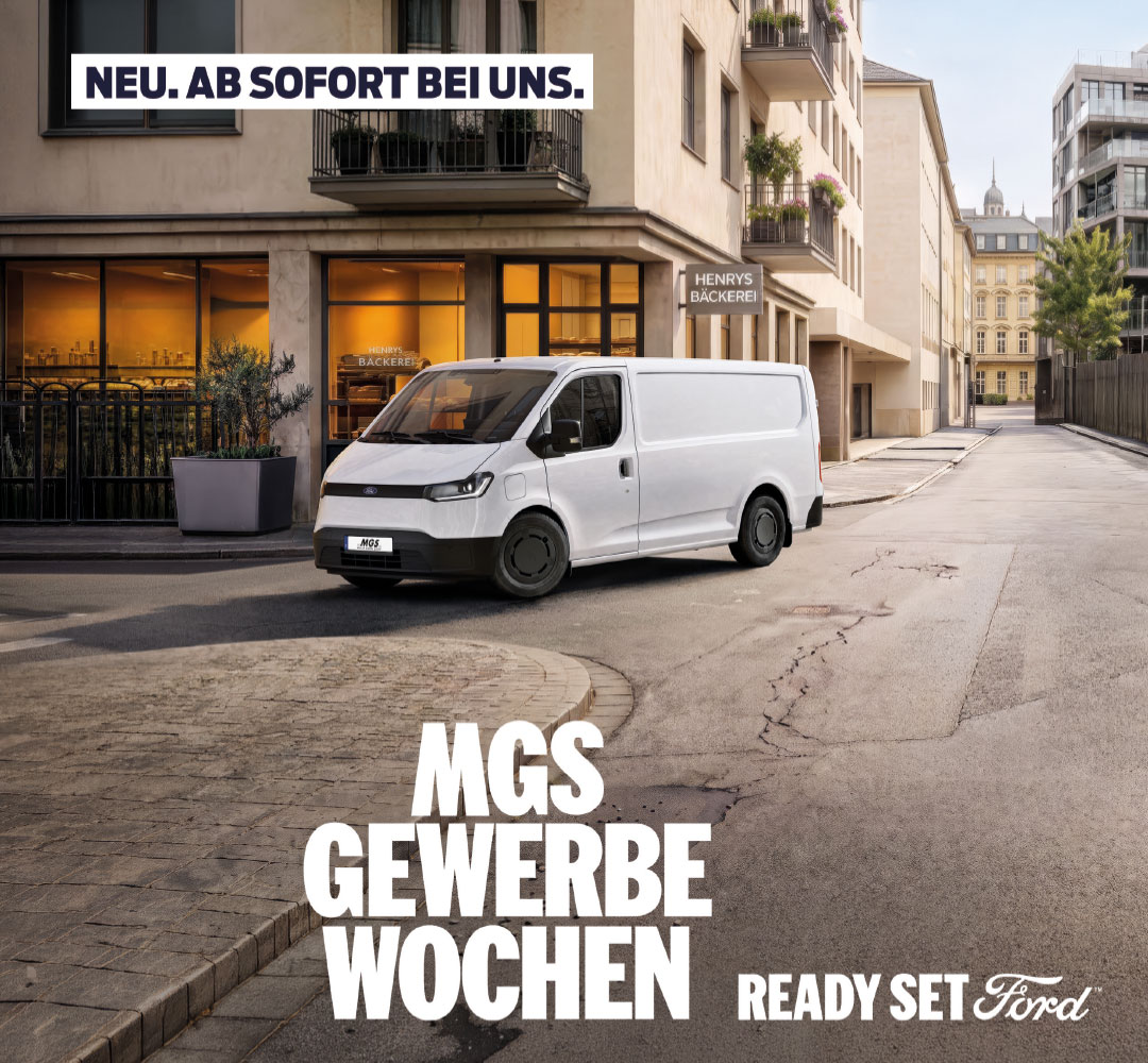 MGS Gewerbewochen mit einem weißen Ford Transit City auf einer Straße in städtischer Umgebung sowie den Hinweisen „Neu. Ab sofort bei uns.“ und „Ready Set Ford“.