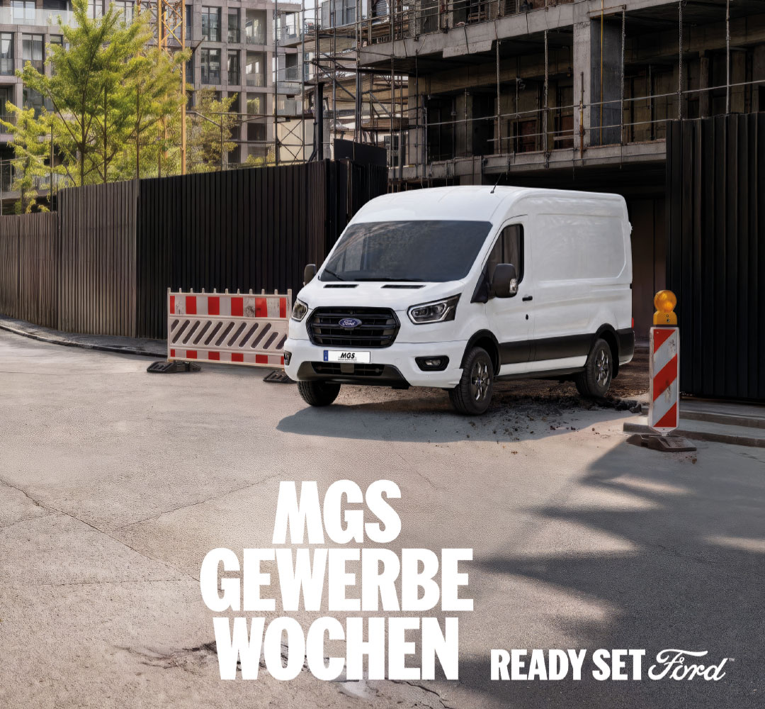 MGS Gewerbewochen mit einem weißen Ford Transit Kastenwagen vor einer Baustelle in städtischer Umgebung sowie dem Schriftzug „Ready Set Ford“.