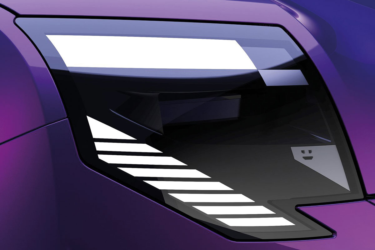 Detailansicht des markant gestalteten LED-Frontscheinwerfers des Nissan Pixo.